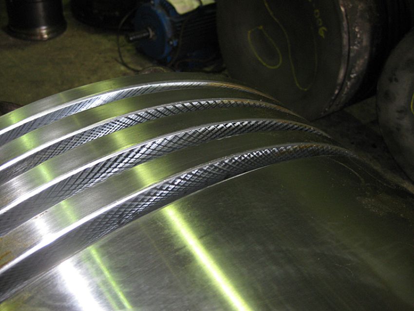 RECONDITIONING OF PISTON CROWNS , EXHAUST VALVES AND SEATS